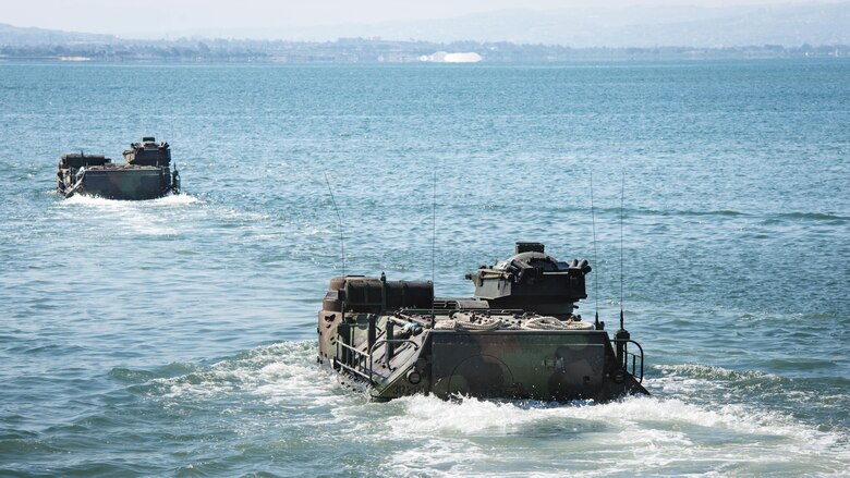 U.S. Marines with Company B, 3rd Amphibious Assault Battalion, 1st Marine Division, get travel in assault amphibious vehicles from Naval Amphibious Base Coronado to participate in the Rim of the Pacific 2016 exercise.  The world's largest international maritime exercise, RIMPAC provides a unique training opportunity that helps participants foster and sustain the cooperative relationships that are critical to ensuring the safety of sea lanes and security on the world's oceans. RIMPAC 2016 is the 25th exercise in the series that began in 1971. 