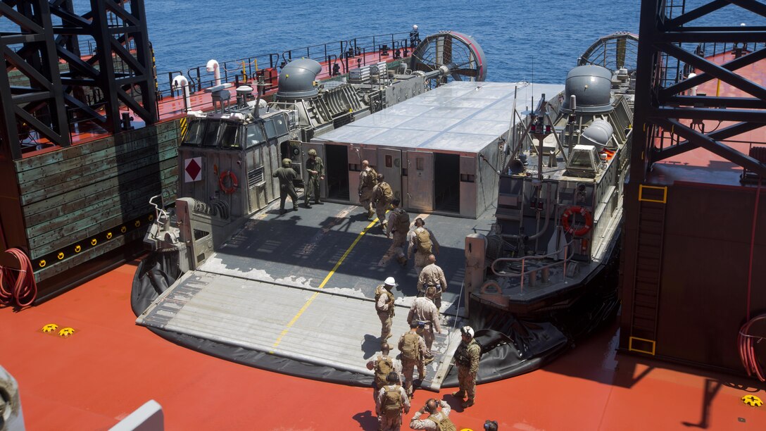 U.S. Marines from the 1st Marine Logistics Group board a Landing Craft Air Cushion in preparation for the USPACOM Amphibious Leaders Symposium 2016 demonstration at sea, near Marine Corps Base Camp Pendleton, California, on July 13, 2016. PALS brings together senior leaders of allied and partner nations from the Indo-Asia Pacific region to discuss key aspects of maritime/amphibious operations, capability development, crisis response, and interoperability. Twenty-two countries, including the U.S., participated.