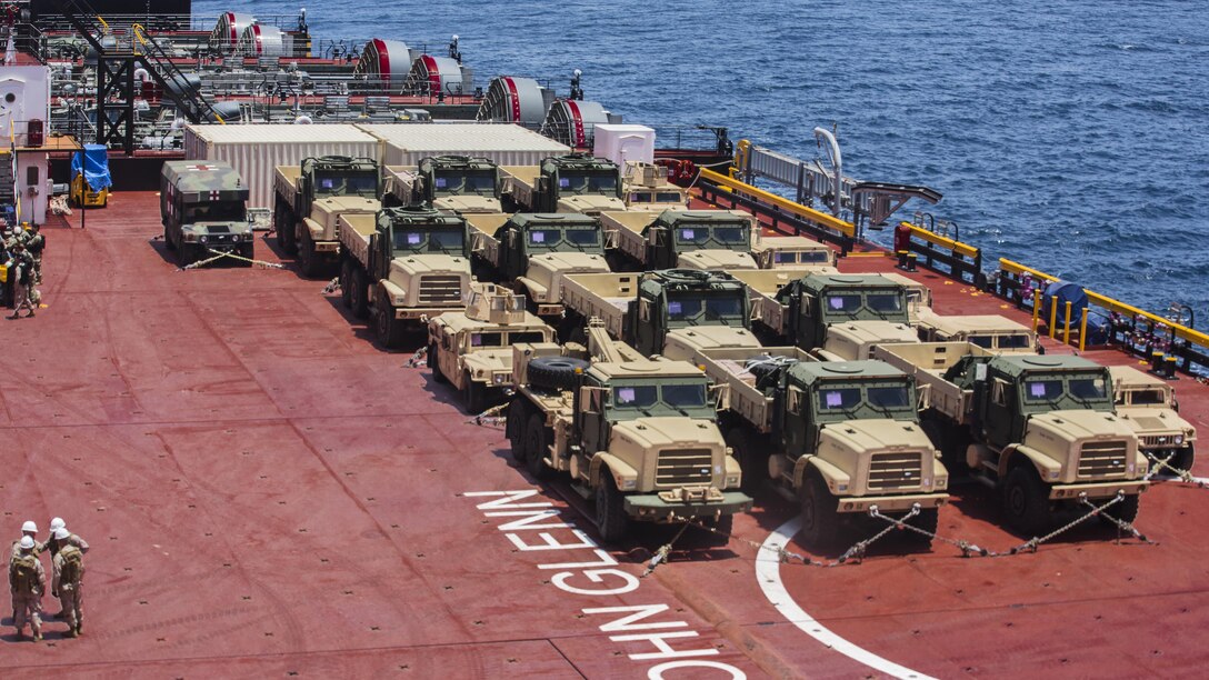 U.S. Marine Corps vehicles are secured onto the deck of the USNS John Glenn  in preparation for the USPACOM Amphibious Leaders Symposium 2016 demonstration at sea, near Marine Corps Base Camp Pendleton, California, on July 13, 2016. PALS brings together senior leaders of allied and partner nations from the Indo-Asia Pacific region to discuss key aspects of maritime/amphibious operations, capability development, crisis response, and interoperability. Twenty-two countries, including the U.S., participated.