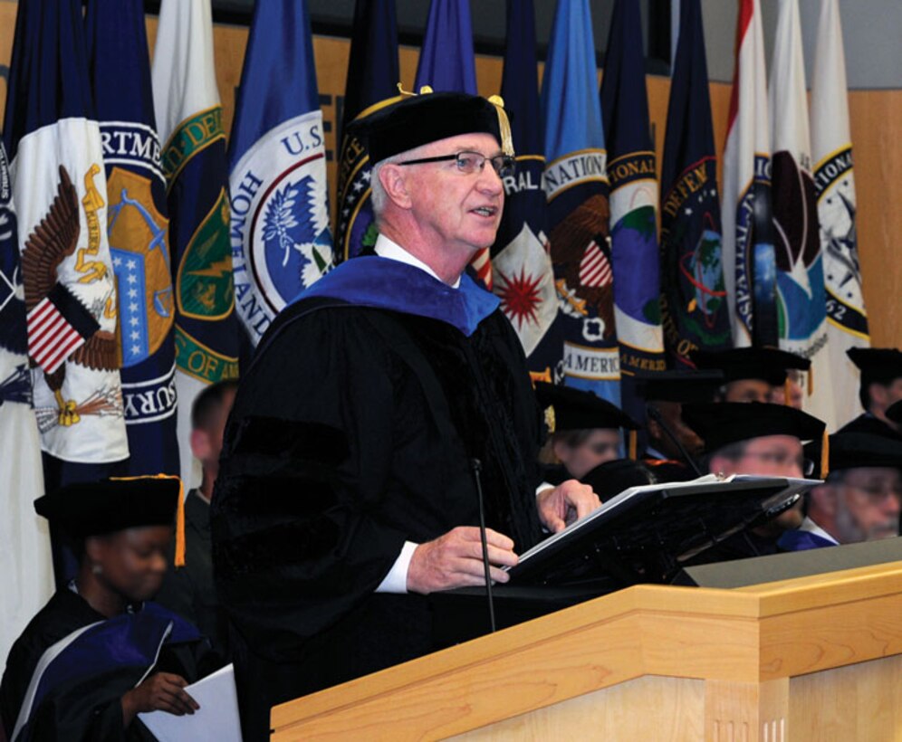 NIU President Dr. David Ellison, shown here welcoming new students at a recent convocation ceremony, announced plans to retire in August 2017 after the university completes its move to Bethesda. 