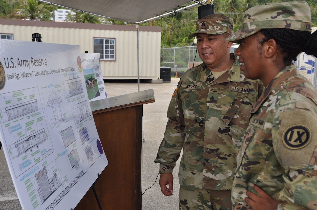 Soldiers in attendance of the  Saipan U.S. Army Reserve Center's groundbreaking ceremony, July 11, 2016. The center will be undergoing a full revitalization to its complex, enhancing the capabilities of the center to include upgraded storm protection, security systems and upgrades to the air conditioning system. The attached Aafes Troop Store will also be receiving a facelift by upgrading the store by 3 times larger than the existing store in order to more effectively serve Soldiers, Families and Veterans. Project completion is scheduled for March 2017. 