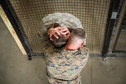 U.S. Marine Corps Gunnery Sgt. Timothy Hanson, Marine Corps Installations East Regional Brig, Camp Lejeune, Jacksonville, North Carolina, demonstrates detainee extraction procedures on U.S. Army Sgt. Jacob Stone of the 79th Military Police Company during Warrior Exercise (WAREX) 86-16-03 at Fort McCoy, Wis., July 12, 2016. WAREX is designed to keep soldiers all across the United States ready to deploy.
(U.S. Army photo by Spc. John Russell/Released)