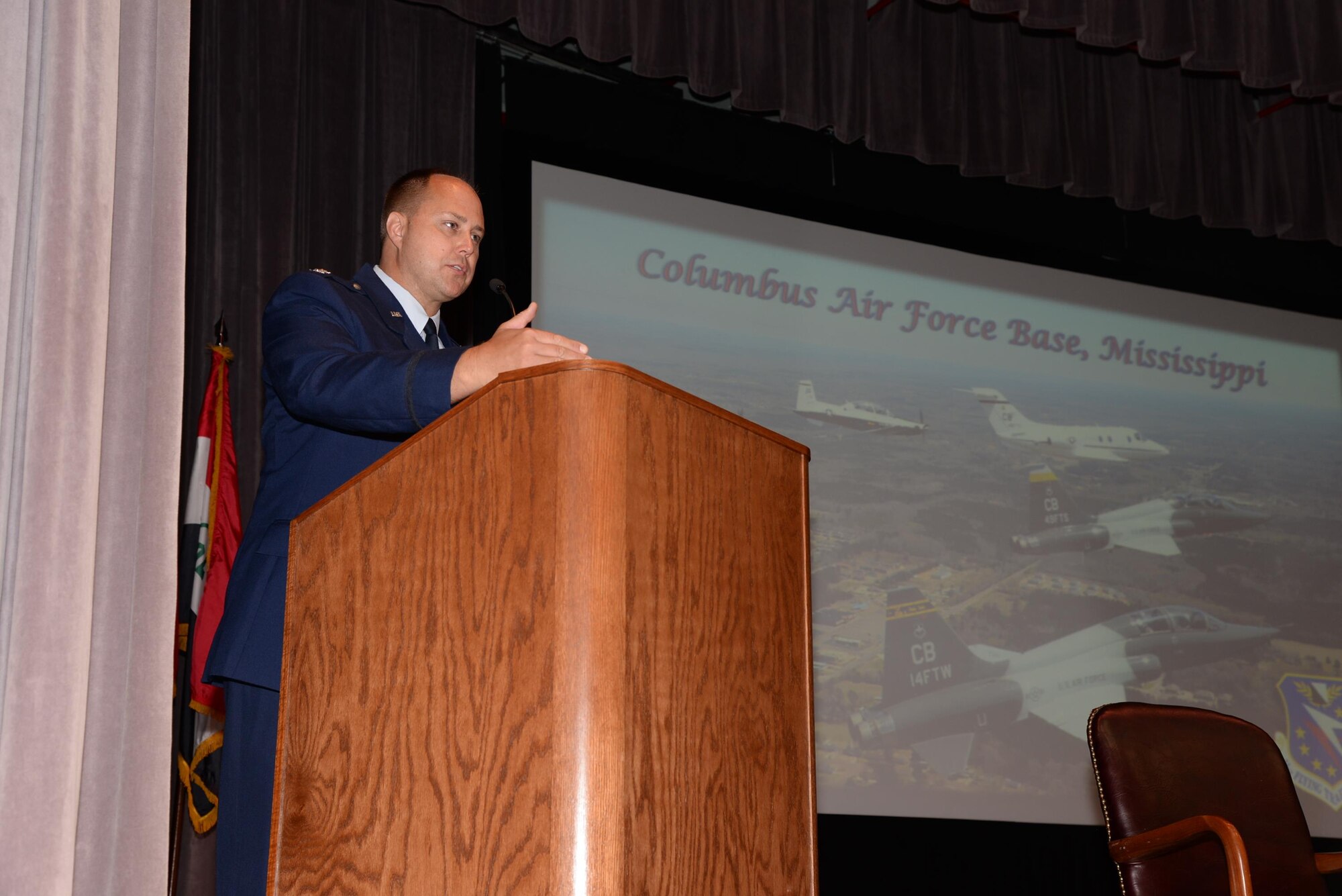 At his very last Specialized Undergraduate Pilot Training Graduation, Col. John Nichols, 14th Flying Training Wing Commander, Columbus Air Force Base, Mississippi, speaks as the speaker for SUPT Class 16-11’s graduation July 8 at the Kaye Auditorium. Nichols spoke about three things he felt were important to not only to the new graduates but also to all others in attendance. (U.S. Air Force photo/Airman 1st Class John Day)