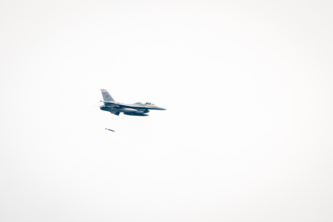 Wisconsin Air National Guard, F-16 Fighting Falcon, 115th Fighter Wing, preforms practice missions using an inert, 500 pound bomb during Warrior Exercise (WAREX) 86-16-03 at Fort McCoy, Wis., July 13, 2016. WAREX is designed to keep soldiers all across the United States ready to deploy. (U.S. Army photo by Spc. John Russell/Released)