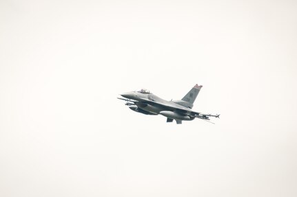 Wisconsin Air National Guard, F-16 Fighting Falcon, 115th Fighter Wing, preforms strafing missions on practice targets during Warrior Exercise (WAREX) 86-16-03 at Fort McCoy, Wis., July 13, 2016. WAREX is designed to keep soldiers all across the United States ready to deploy. (U.S. Army photo by Spc. John Russell/Released)