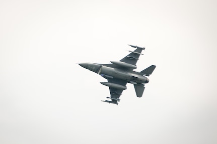 Wisconsin Air National Guard, F-16 Fighting Falcon, 115th Fighter Wing, preforms strafing missions on practice targets during Warrior Exercise (WAREX) 86-16-03 at Fort McCoy, Wis., July 13, 2016. WAREX is designed to keep soldiers all across the United States ready to deploy. (U.S. Army photo by Spc. John Russell/Released)