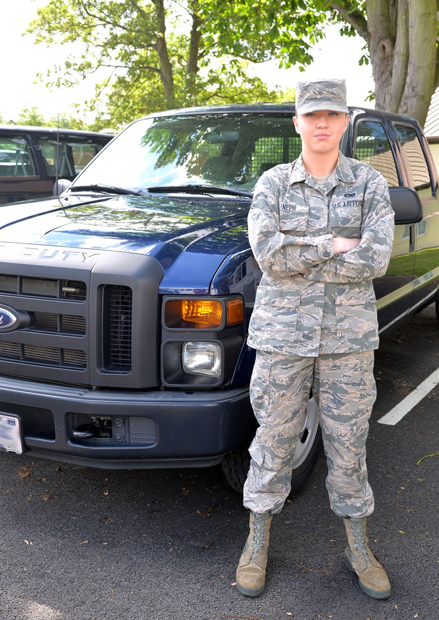 U.S. Air Force Airman Anna Neph, 100th Logistics Readiness Squadron vehicle operator, poses for a photograph July 8, 2016, on RAF Mildenhall, England. It was Neph’s dream since fourth grade to join the Air Force, and she arrived in England shortly after raising her hand at age 17 to take the oath of enlistment and serve her country. (U.S. Air Force photo by Karen Abeyasekere) 