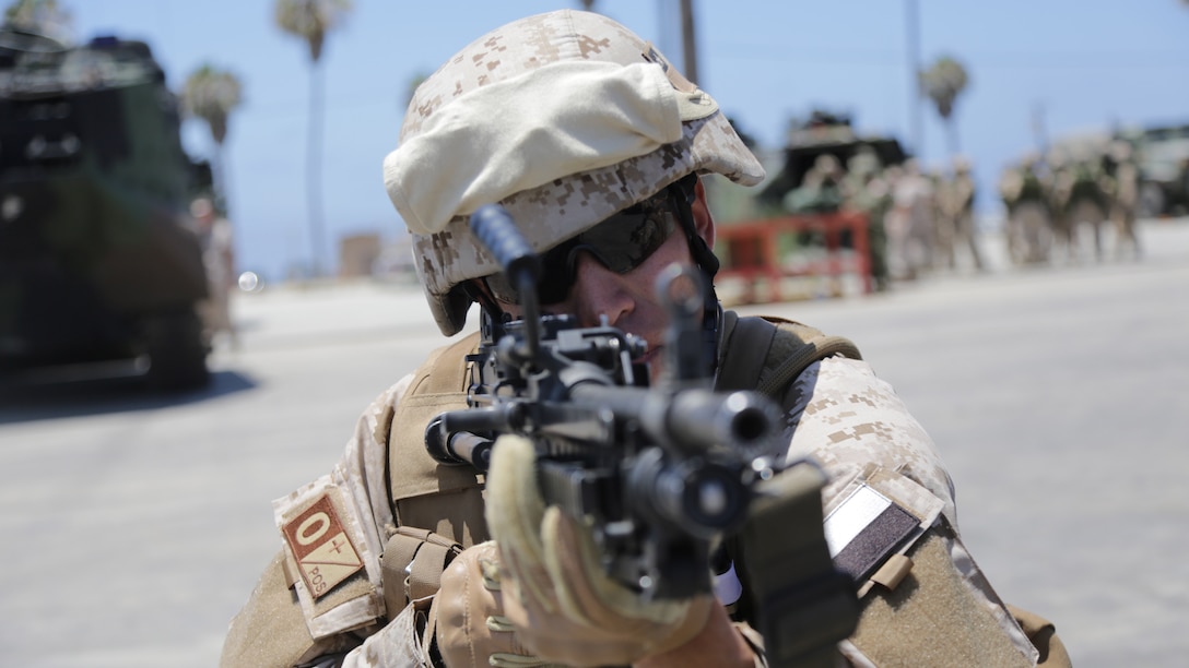 A Marine practices engaging mock enemies as part of assault amphibious vehicle familiarization at Marine Corps Base Camp Pendleton, California, July 8, 2016. The familiarization training involved military augments from Chile, Canada and Mexico and serves as a building block for future exercises during Rim of the Pacific 2016. Twenty-six nations, more than 40 ships and submarines, more than 200 aircraft and 25,000 personnel are participating in RIMPAC from June 30 to August 4, 2016, in and around the Hawaiian Islands and Southern California. The world's largest international maritime exercise, RIMPAC provides a unique training opportunity that helps participants foster and sustain the cooperative relationships that are critical to ensuring the safety of sea lanes and security on the world's oceans. RIMPAC 2016 is the 25th exercise in the series that began in 1971. 