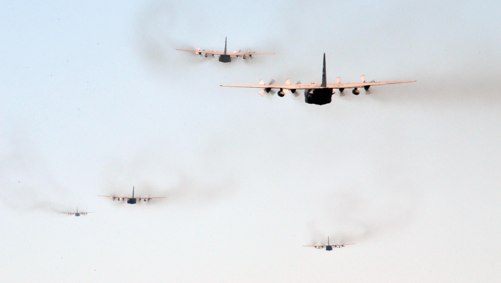 C-130 Hercules from the 700th Airlift Squadron take off in formation from Dobbins Air Reserve Base, Ga., on July 9, 2016. The 94th Airlift Wing formation conducted proficiency training missions over downtown Atlanta and much of the metro area. (U.S. Air Force photo/Tech. Sgt. Kelly Goonan)