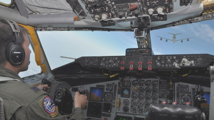 Lt. Col. Eric Rivero, 349th Air Refueling Squadron operations officer, flies toward another KC-135 Stratotanker during a Receiver/Tanker training flight July 13, 2016, McConnell Air Force Base, Kan. Real-world training flights enable Team McConnell pilots to gain hands-on experience for R/T missions a simulator simply can’t provide. (U.S. Air Force photo by Senior Airman Preston Webb)