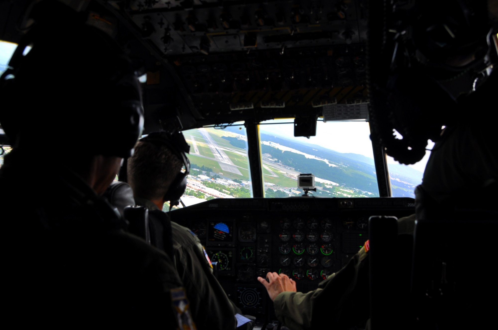 Aircrew from the 700th Airlift squadron prepare to land at Dobbins Air Reserve Base, Ga., after the Hercs Over Atlanta mission on July 9, 2016. The exercise was executed to fly proficiency training missions over downtown Atlanta and much of the metro area. (U.S. Air Force photo by Senior Airman Lauren Douglas)