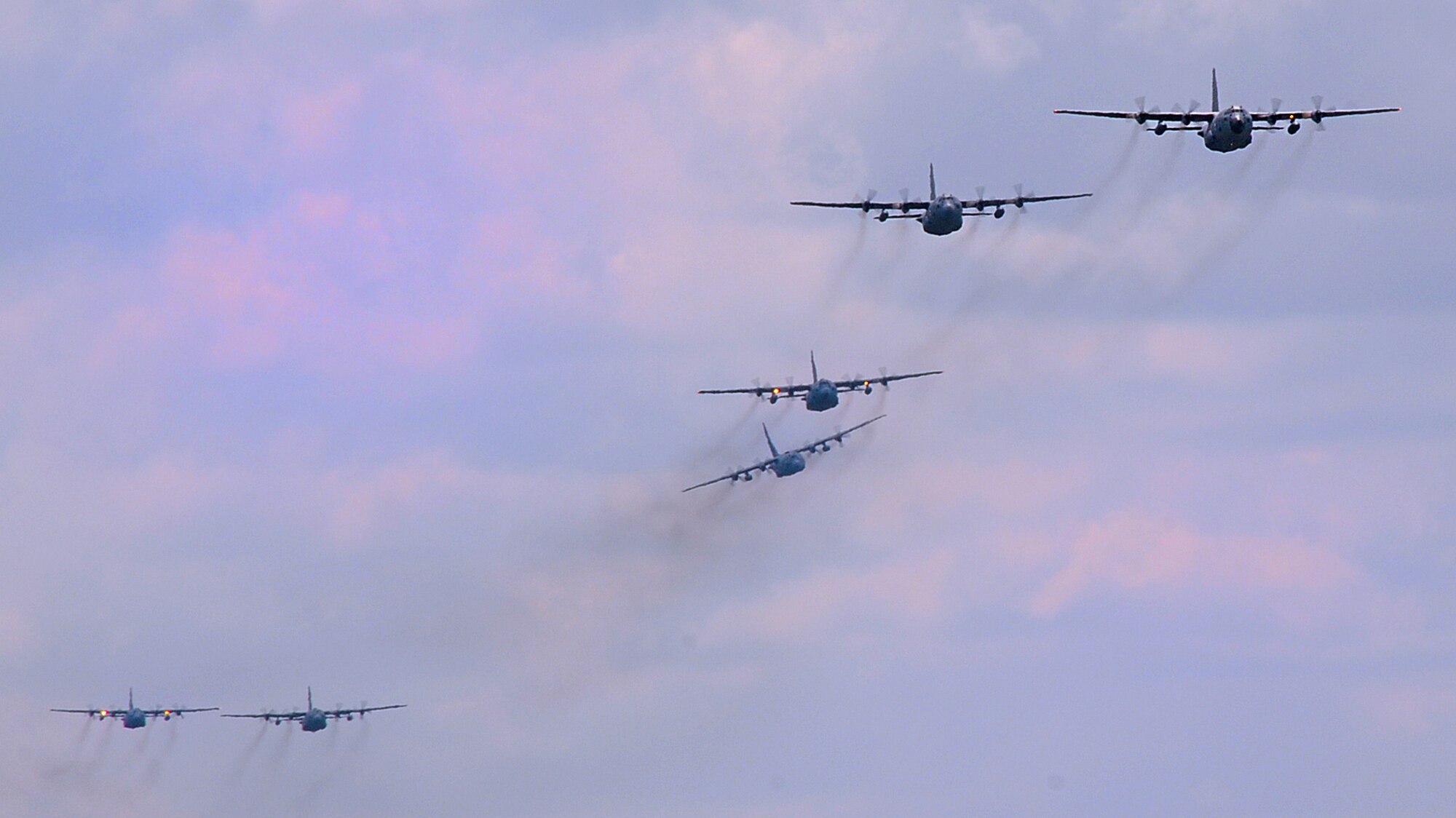 Six C-130s from the 94th Airlift Wing fly over Dobbins Air Reserve Base, Ga. during a formation flight on July 9, 2016. The formation's flight path traversed over the metro Atlanta area and gave the wing's Airmen a chance to showcase their skills in view of the local community.(U.S. Air Force photo by Staff Sgt. Alan Abernethy)