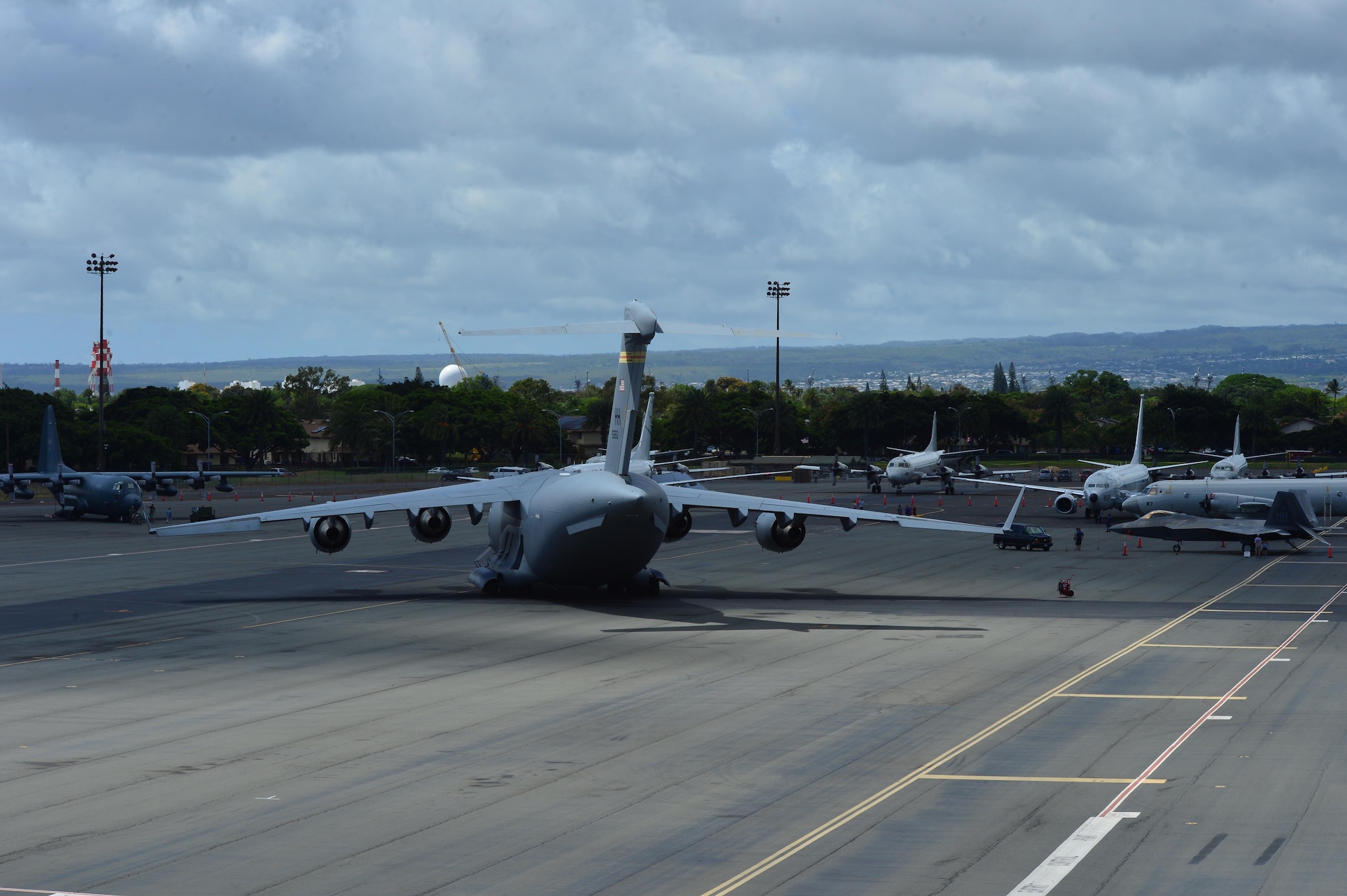 Aircraft from the U.S. Army, U.S. Navy, U.S. Air Force along with aircraft from Royal Canadian Air Force and The Japan Maritime Self-Defense Force where on display during the Rim of the Pacific 2016 open house on Joint Base Pearl Harbor-Hickam, July 09, 2016. Twenty-six nations, 49 ships, six submarines, about 200 aircraft, and 25,000 personnel are participating in Rim of the Pacific 2016 from June 29 to Aug. 4 in and around the Hawaiian Islands and Southern California. The world’s largest international maritime exercise, RIMPAC provides a unique training opportunity while fostering and sustaining cooperative relationships between participants critical to ensuring the safety of sea lanes and security on the world’s oceans. RIMPAC 16 is the 25th exercise in the series that began in 1971. (U.S. Air Force photo by Tech. Sgt. Aaron Oelrich)