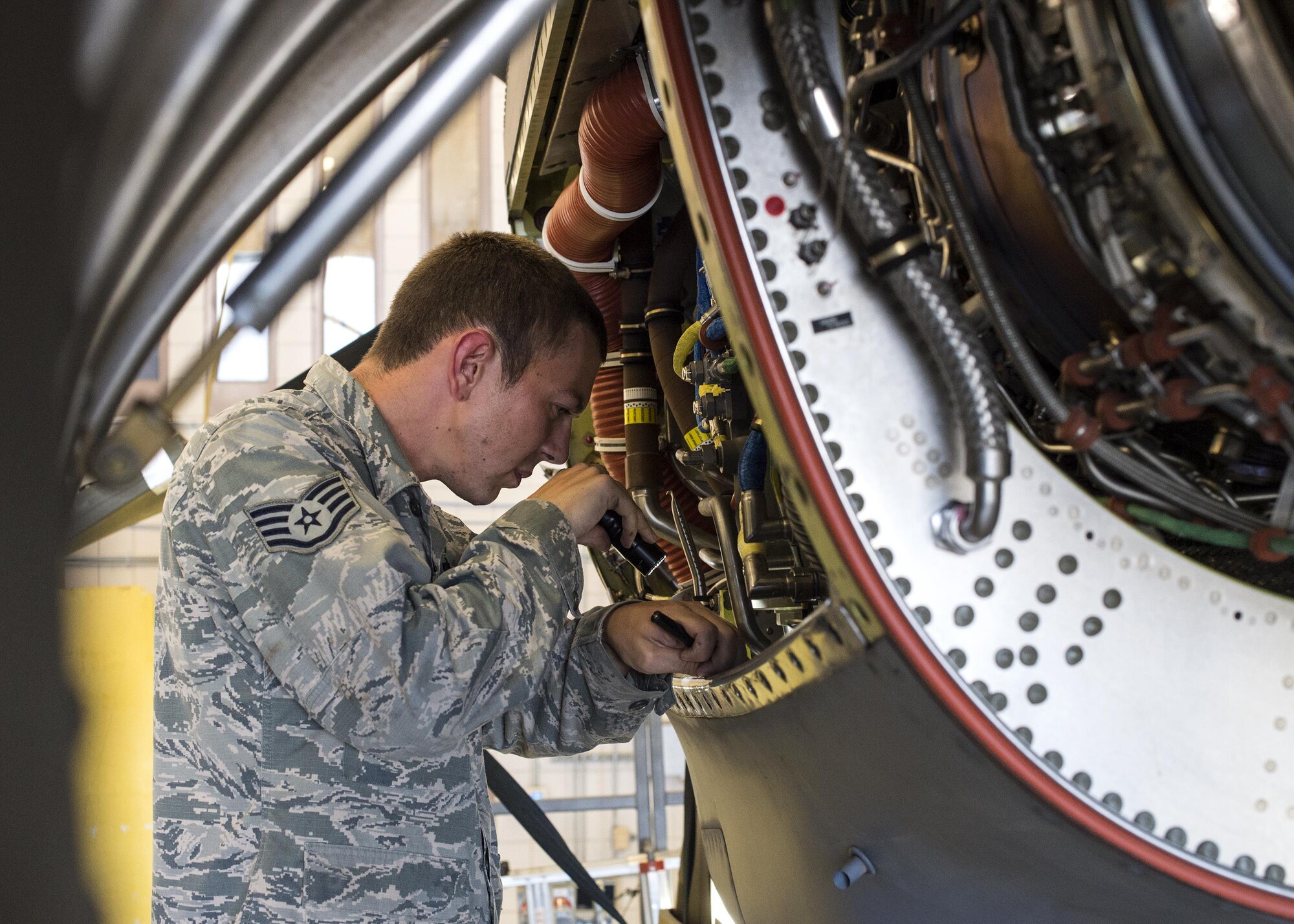 U.S. Air Force Staff Sgt. Richard Adcock, 23d Maintenance Group quality assurance inspector, performs a zonal inspection on an HC-130J Combat King II, July 7, 2016, at Moody Air Force Base, Ga. Adcock was tasked to inspect engines of the aircraft after maintenance to certify they were clean and free of foreign objects or damaged parts. (U.S. Air Force photo by Airman 1st Class Janiqua P. Robinson)