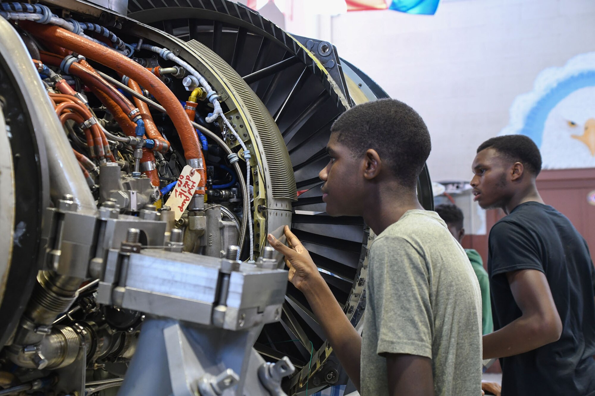 Local high school students get “hands on” experience with an A-10 Thunderbolt engine on July 13, 2016. The students are receiving a tour of the maintenance sections of the 307th Bomb Wing at Barksdale Air Force Base, La. while attending the Aviation Maintenance Summer Camp offered by Southern University at Shreveport. (U.S. Air Force photo by Master Sgt. Dachelle Melville/Released)