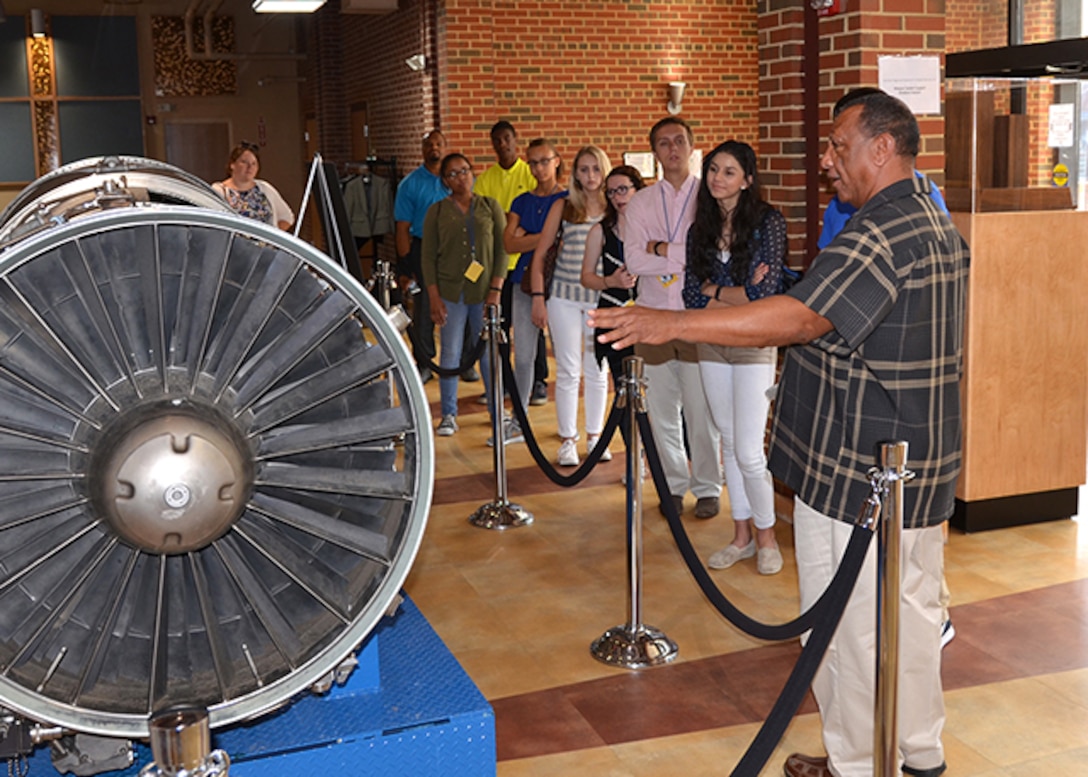 Defense Logistics Agency Aviation's Ronald Taylor, product specialist, Supplier Operations Directorate, provides an overview and discusses weapon system support for the F100 engine to a group of students from the Hanover Regional Governor's School for Career and Technical Advancement who visited Defense Supply Center Richmond, Virginia, July 14, 2016, to learn about the various career fields that make up the DLA Aviation and DLA Installation Support at Richmond. 
