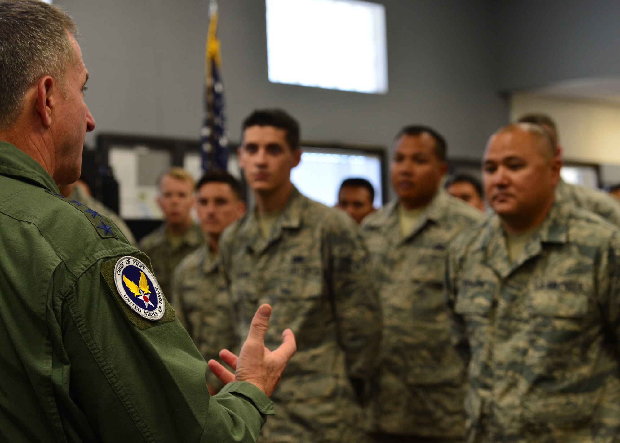 Gen. David L. Goldfein, Chief of Staff of the Air Force, speaks with Airmen from the 15th Maintenance Group and the Hawaii Air National Guard’s 154th Maintenance Group on Joint Base Pearl Harbor-Hickam, Hawaii, July 12, 2016. Earlier in the day, Goldfein officiated the Pacific Air Forces assumption-of-command ceremony designating Gen. Terrence J. O'Shaughnessy as the commander of PACAF. (U.S. Air Force photo by Tech. Sgt. Aaron Oelrich)  