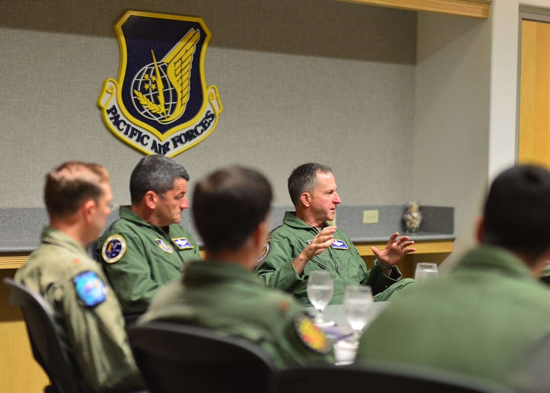 Gen. David L. Goldfein, Chief of Staff of the Air Force, speaks with pilots from the 15th Wing and the Hawaii Air National Guard’s 154th Wing on Joint Base Pearl Harbor-Hickam, Hawaii, July 12, 2016. Earlier in the day, Goldfein officiated the Pacific Air Forces assumption-of-command ceremony designating Gen. Terrence J. O'Shaughnessy as the commander of PACAF. (U.S. Air Force photo by Tech. Sgt. Aaron Oelrich)  