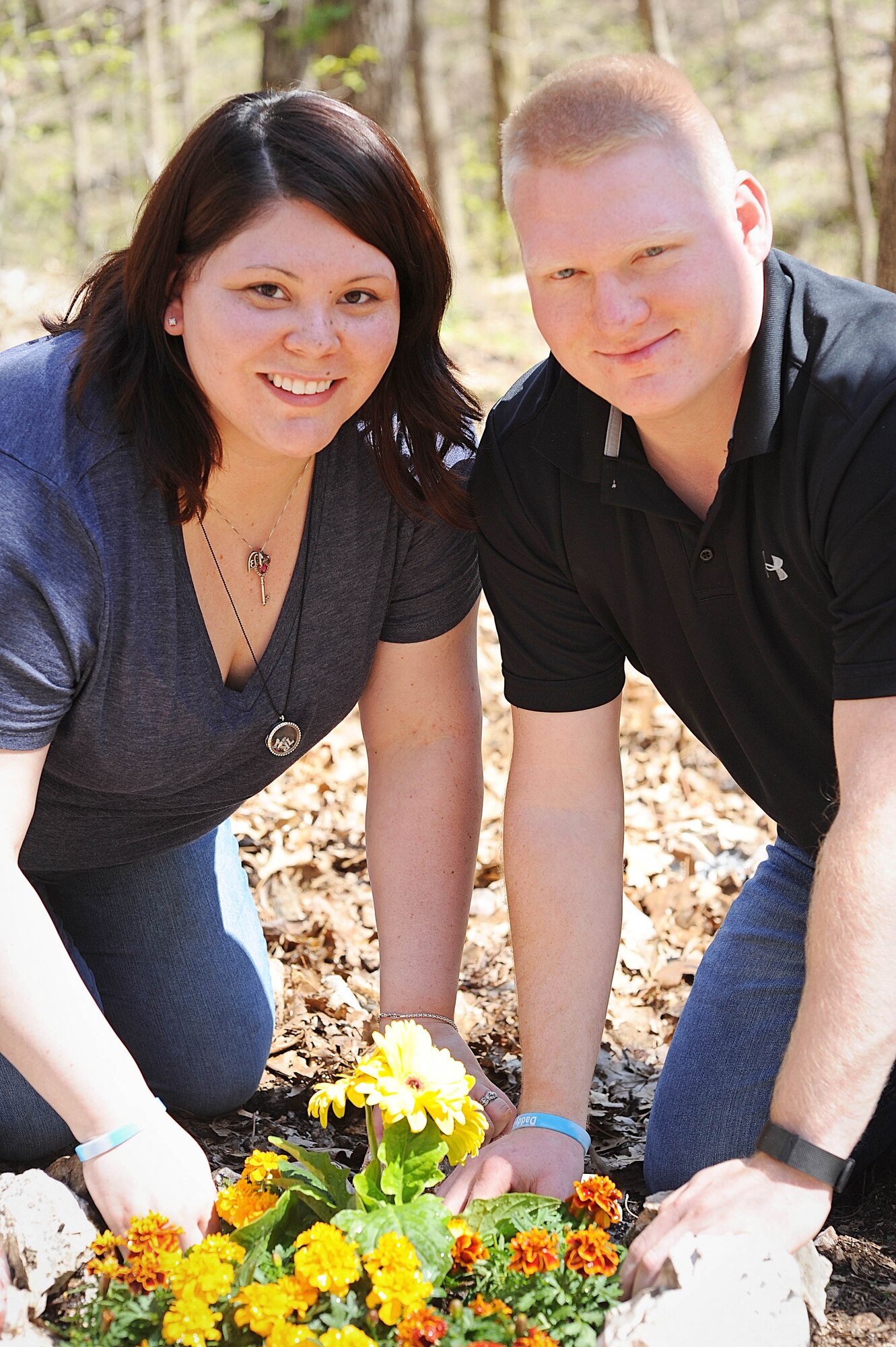 Senior Airman Nicholas Johnson and his wife, Cindy, create a memorial at a science nature preserve in Missouri for the child they lost on Cindy’s birthday--Jan. 12. Nick, who is assigned to the 375th Civil Engineer Squadron, was deployed when Cindy became hospitalized but thanks to herculean efforts from their military family, he made it back in time to be with his wife when Logan Robert was born at five months into her pregnancy.
