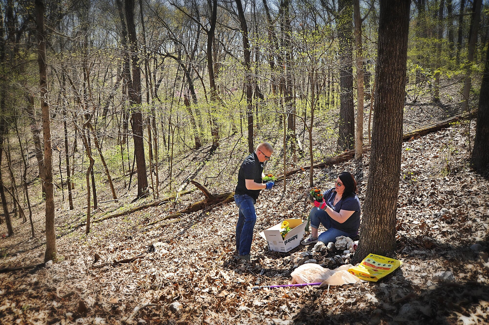 Senior Airman Nicholas Johnson and his wife, Cindy, create a memorial at a science nature preserve in Missouri for the child they lost on Cindy’s birthday--Jan. 12. Nick, who is assigned to the 375th Civil Engineer Squadron, was deployed when Cindy became hospitalized but thanks to herculean efforts from their military family, he made it back in time to be with his wife when Logan Robert was born at five months into her pregnancy.