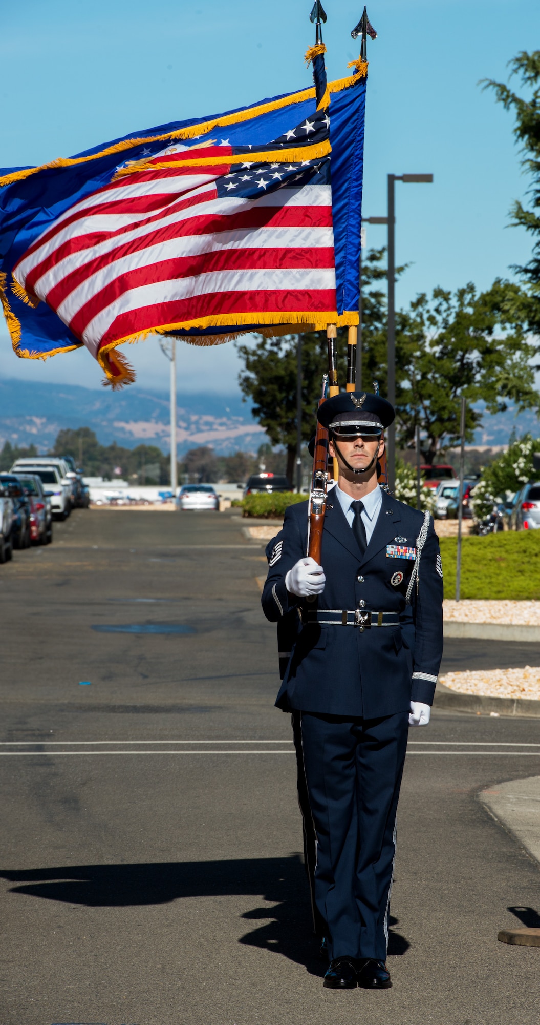 Travis Honor Guardsmen prepare to post the colors during the 60th Medical Group's change-of-command ceremony at Travis Air Force Base, Calif., July 8, 2016. Col. Michael Higgins, 60th Medical Group commander, assumed command of David Grant USAF Medical Center and is now responsible for the largest hospital in the Air Force with a work force of over 2,400 personnel. (U.S. Air Force photo by Louis Briscese/Released)