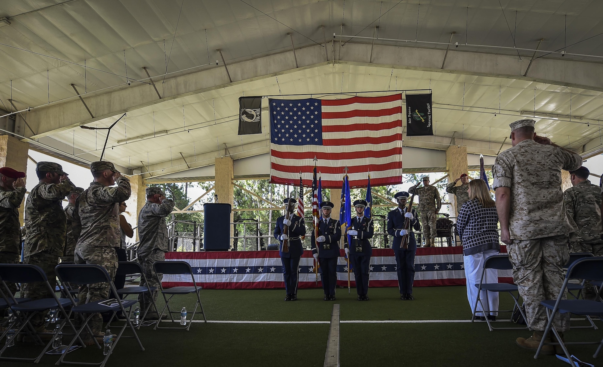 The Hurlburt Field Honor Guard present the colors during the 24th Special Operations Wing assumption of command at Hurlburt Field, Fla., July 14, 2016. Heithold presided over the assumption of command, where Martin took command of the sole Special Tactics wing in the Air Force. (U.S. Air Force photo by Senior Airman Ryan Conroy) 