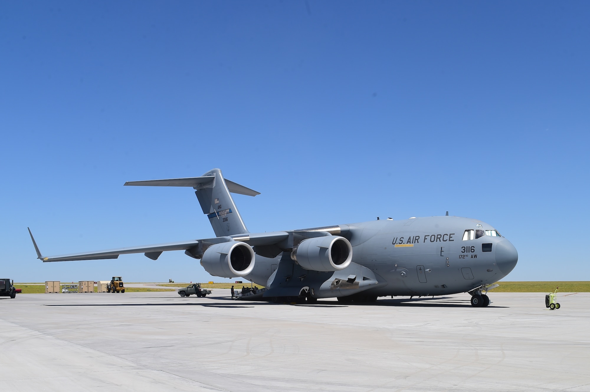 A C-17 Globemaster III from the Mississippi Air National Guard 183rd Airlift Wing, is loaded with equipment and supplies that will be transported to Papa, Hungary, in order to support the 120th Fighter Squadron while on deployment July 12, 2016, on Buckley Air Force Base, Colo. The 120th FS is conducting training operations with the Hungarian Air Force as a part of the European Reassurance Initiative. (U.S. Air Force photo by Airman 1st Class Luke W. Nowakowski/Released)