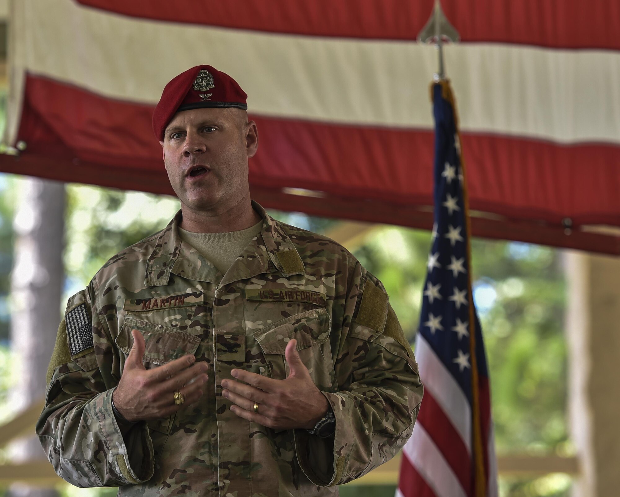 Col. Michael Martin, the commander of the 24th Special Operations Wing, speaks during the 24th SOW assumption of command at Hurlburt Field, Fla., July 14, 2016. The 24th SOW, previously commanded by Col. Matthew Davidson, boasts a unique ground operations mission set and approximately 1,500 of the 2,500 Special Tactics members in the Air Force. Martin previously served as the deputy commander of Special Operations Command-Africa in Stuttgart, Germany. (U.S. Air Force photo by Senior Airman Ryan Conroy) 