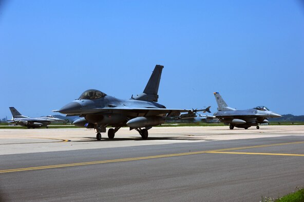 U.S. Air Force and ROKAF jets taxi in as a result of Buddy Wing 16-6 July 14, 2016 at Kunsan Air Base, Republic of Korea. Buddy Wing exercises are conducted at various ROKAF and U.S. Air Force bases multiple times throughout the year on the Korean peninsula. The combined fighter exchange program provides pilots an opportunity to exchange ideas and practice combined tactics in order to fight and fly as one Allied force. (U.S. Air Force photo by Senior Airman Ashley L. Gardner/ Released)