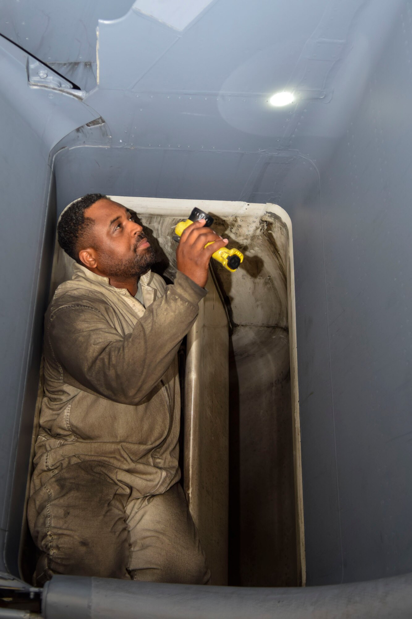 Emmanuel Jackson, Oklahoma City Air Logistics Complex aircraft mechanic, conducts a detailed inspection of the jet engine intakes of a B-1B Lancer being prepared for an engine-run and functional test June 13, 2016, Tinker Air Force Base, Okla. Prevention of foreign object damage, better known as FOD, is a item of critical importance which OC-ALC has worked to reduce by providing additional focus and back-up to the mechanics which has resulted in a precipitous drop in incidents. (U.S. Air Force photo/Greg L. Davis)