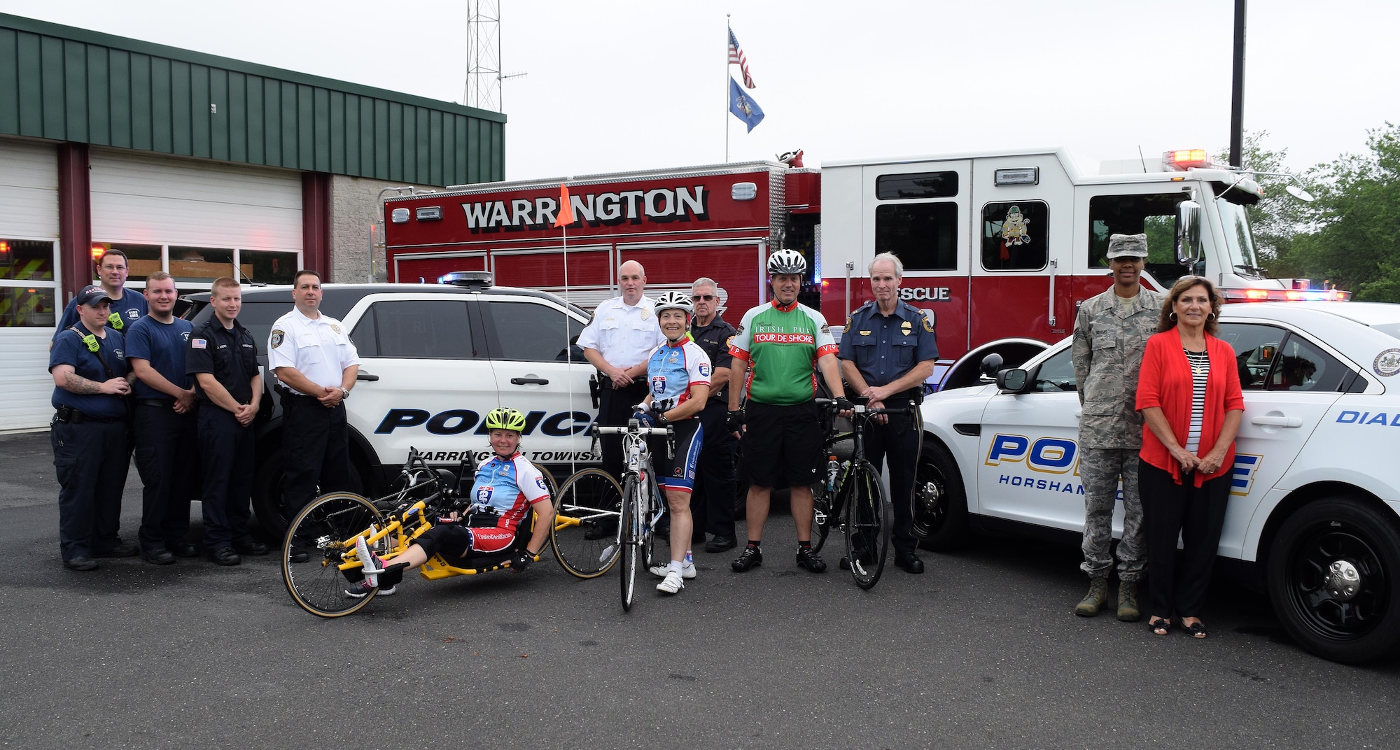 First responders from Warrington and Horsham, Pa. greet members of the Horsham Air Guard Station Project HERO team and Horsham, Pennsylvania’s chief of police at the Warrington Township Fire Company Number 1 along Easton Road, Warrington Pa. July 14, 2016. The station stopover, was the midpoint of a 15 mile trial run of a planned cycling route for upcoming larger events.  (U.S. Air National Guard photo by Master Sgt. Christopher Botzum)
