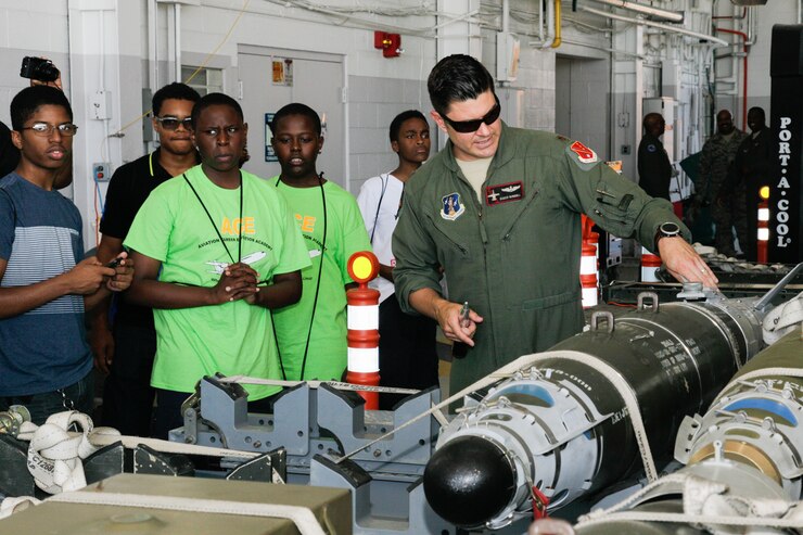 160712-Z-RD118-007 -- Major William Rundell, director of operations of the 127th Operations Group, talks about the A-10 Thunderbolt II’s weapons system to a group of  students from Wayne State University’s Aviation Career Education academy during a field trip at Selfridge Air National Guard Base, Mich., July 12, 2016.  ACE academy is an annual week long summer camp for high school students.   (U.S. Air National Guard photo by John Brandenburg)