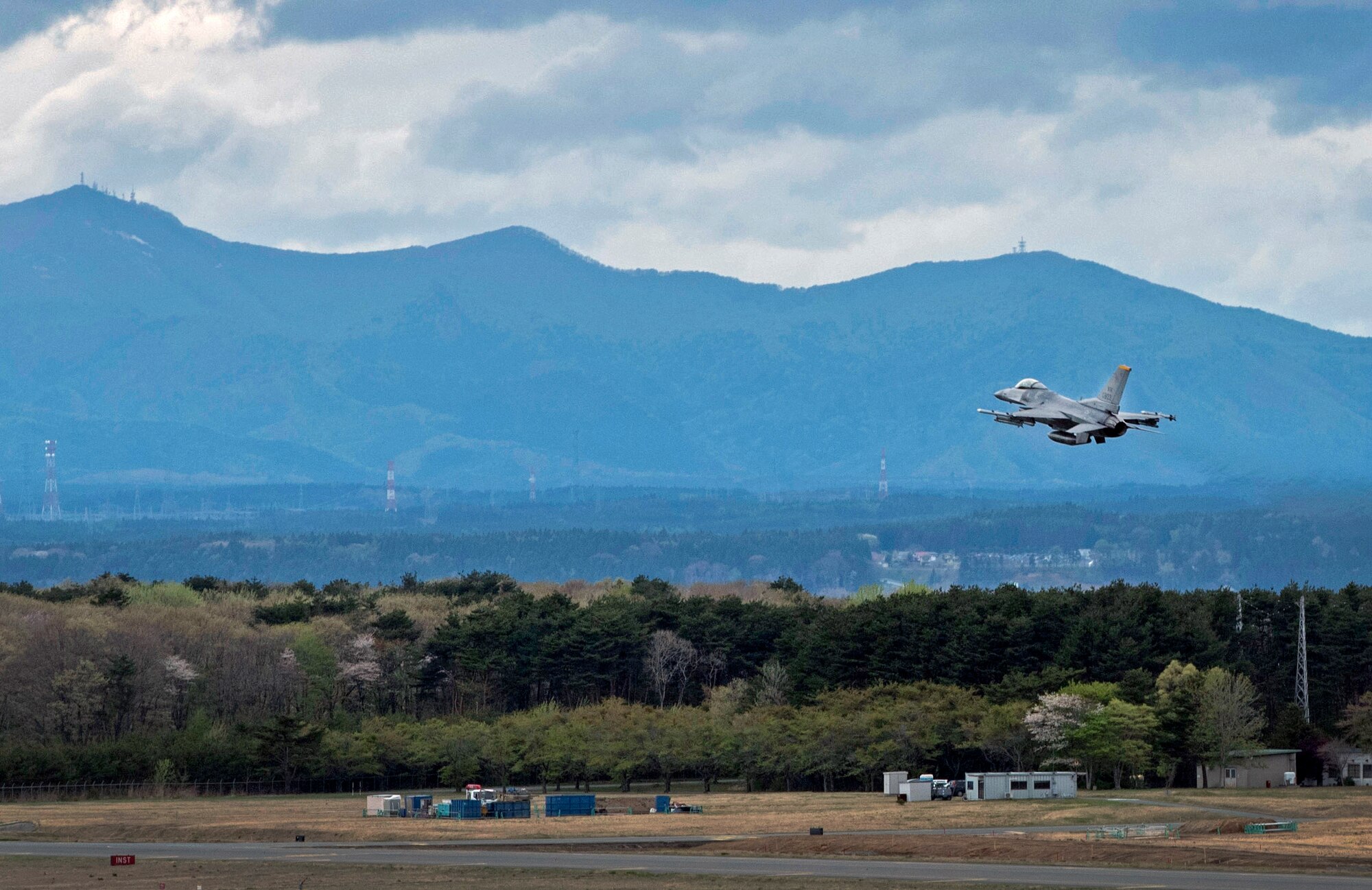 An F-16 Fighting Falcon takes off at Misawa Air Base, Japan, May 4, 2016. Misawa works alongside other bases throughout the Pacific Theater to provide agile combat support, while increasing the United States' partnership between international allies. The wing's capabilities are tested through training sorties ensuring pilots are prepared to fight tonight. (U.S. Air Force photo/Airman 1st Class Jordyn Fetter)