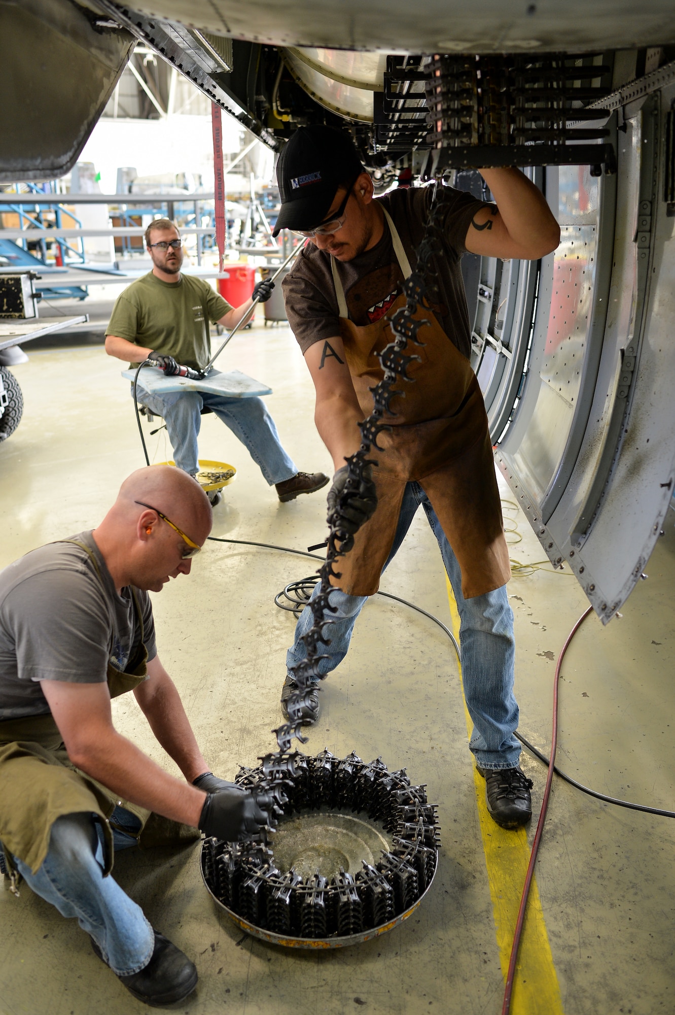 Aircraft ordnance system mechanics from the 531st Commodities Maintenance Squadron remove the ammunition linkage from an A-10 Thunderbolt II aircraft at Hill Air Force Base, Utah, May 24, 2016. 531st CMMXS delivers reconditioned 20 mm and 30 mm aircraft guns back to warfighters from every military branch. (U.S. Air Force photo by R. Nial Bradshaw)