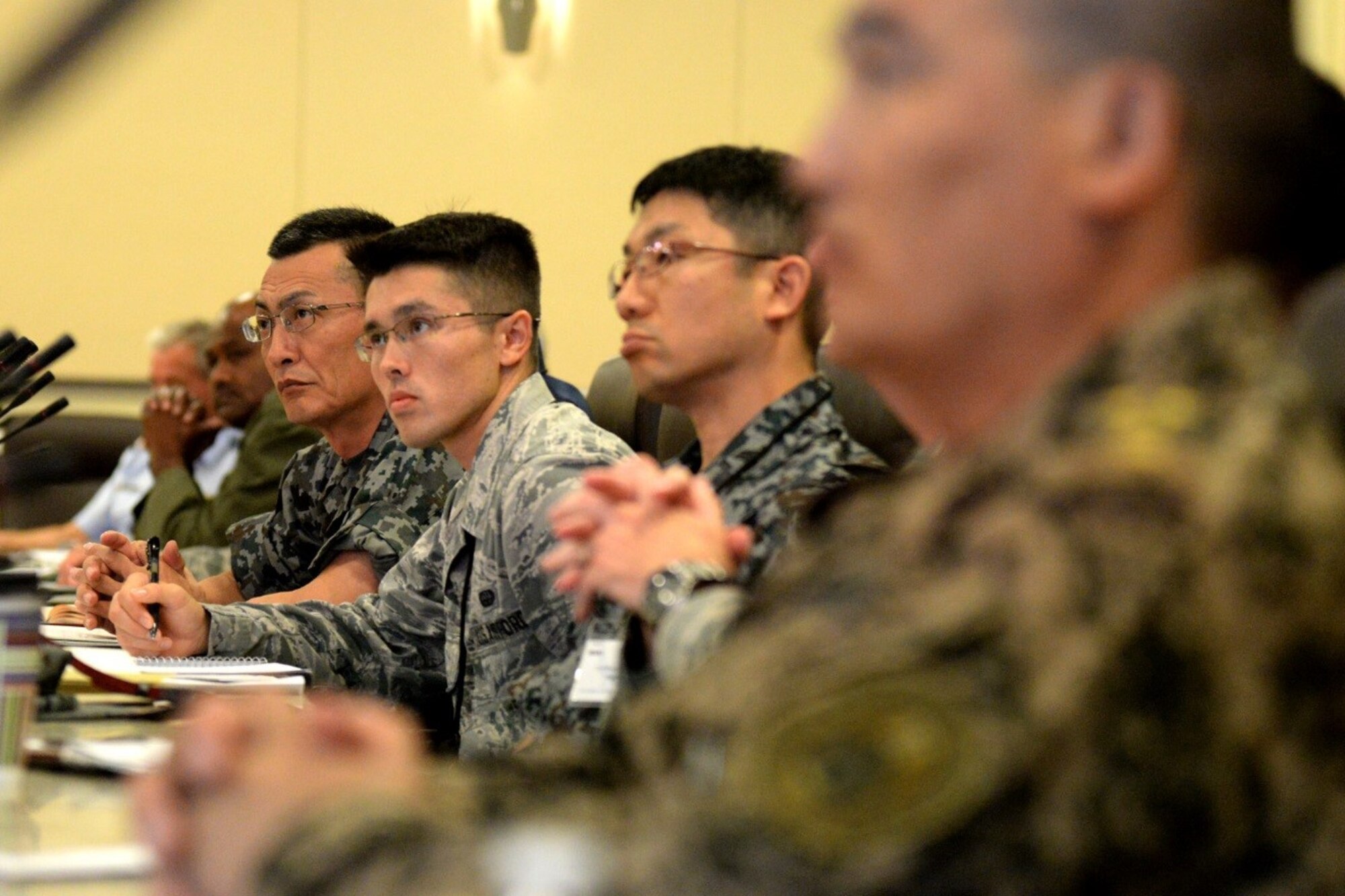 Attendees listen to a Profession of Arms Center of Excellence brief during the Senior Enlisted Leader International Summit (SELIS) on Joint Base Andrews, Md., July 13, 2016. The SELIS is a forum of international senior enlisted leaders hosted by Chief Master Sergeant of the Air Force James A. Cody. (U.S. Air Force photo/ Tech. Sgt. Matt Davis)