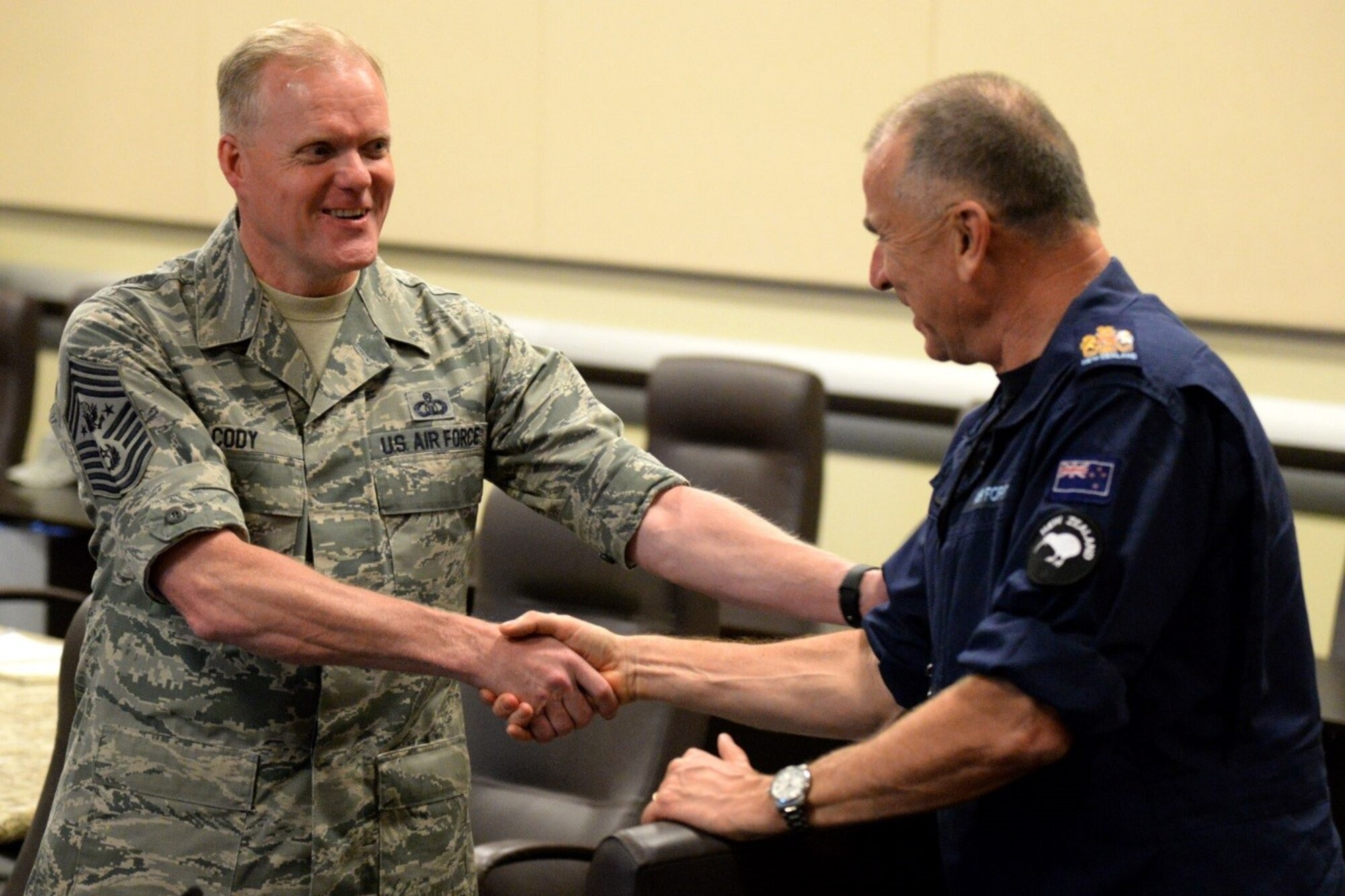 Chief Master Sergeant of the Air Force James A. Cody greets New Zealand Warrant Officer of Air Force Mark Harwood during the Senior Enlisted Leader International Summit (SELIS) on Joint Base Andrews, Md., July 13, 2016. The SELIS is a forum of international senior enlisted leaders hosted by the CMSAF. (U.S. Air Force photo/ Tech. Sgt. Matt Davis)