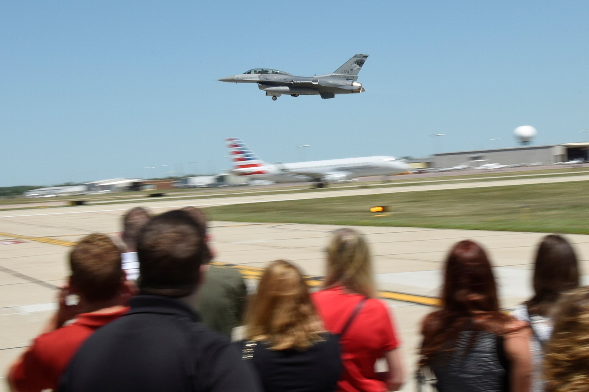 SIOUX FALLS, S.D. -  Members of the Sioux Falls Area Chamber of Commerce Young Professionals Network got an up close view of an F-16 launch from Joe Foss Field, S.D. during a tour and briefing given by members of the  South Dakota Air National Guard on July 13, 2016.(U.S. Air National Guard photo by Senior Master Sgt. Nancy Ausland/Released)