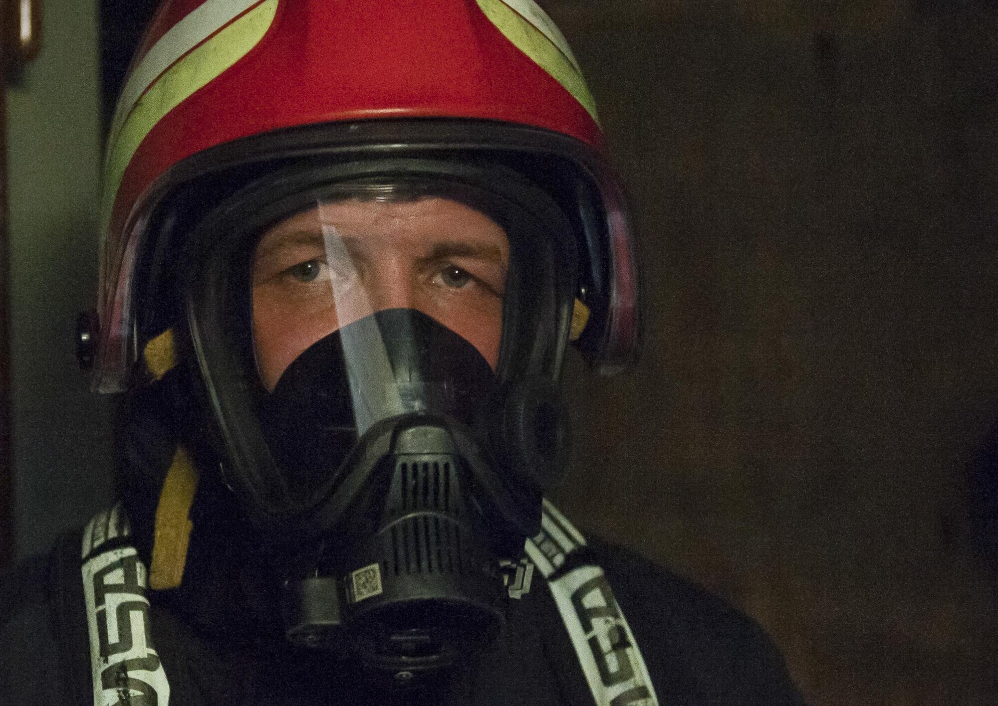 Lithuanian air force Capt. Egidijus Rastikis, safety representative, participates in a training exercise hosted by the 435th Construction and Training Squadron July 11, 2016, at Ramstein Air Base, Germany. Lithuanian forces trained on several scenarios such as rescuing trapped victims, extinguishing fires in plane cabins and more with the help of 435th CTS Airmen, who provided equipment and oversaw the cooperative effort between U.S. and Lithuanian Airmen.