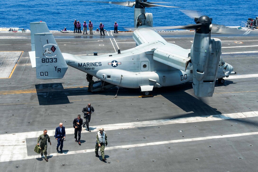 Vice President Joe Biden walks on the flight deck of the USS John C. Stennis after exiting an MV-22 Osprey during the 2016 Rim of the Pacific exercise in the Pacific Ocean, July 14, 2016. Navy photo by Petty Officer 2nd Class Jonathan Jiang