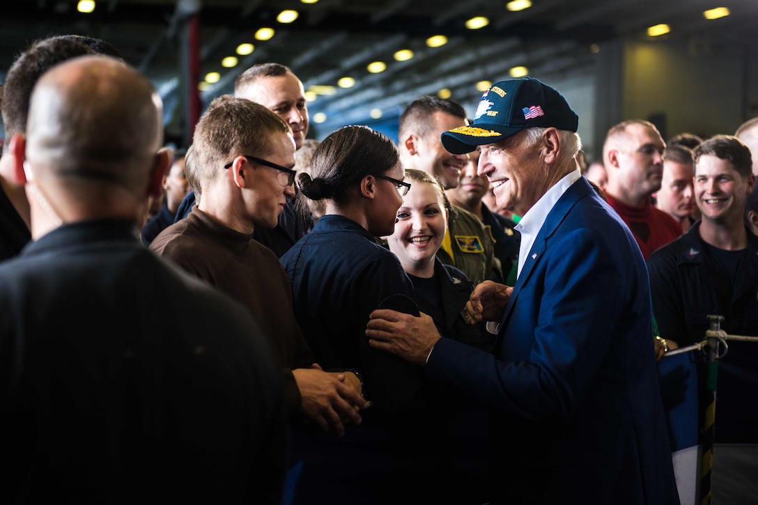 Vice President Joe Biden shakes hands and meets with sailors in the hangar bay of the USS John C. Stennis during the Rim of the Pacific maritime exercise in the Pacific Ocean, July 14, 2016. Navy photo by Petty Officer 3rd Class Luke Moyer