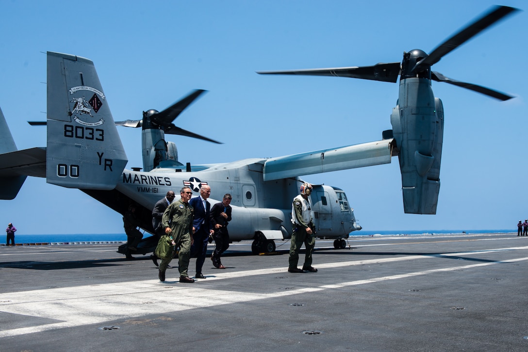 Vice President Joe Biden exits a Marine Corps MV-22 Osprey on the flight deck of the USS John C. Stennis during the 2016 Rim of the Pacific exercise in the Pacific Ocean, July 14, 2016. The world’s largest international maritime exercise, RIMPAC involves about 25,000 participants from 26 nations, 49 ships, six submarines and about 200 aircraft. Navy photo by Petty Officer 3rd Class Tomas Compian