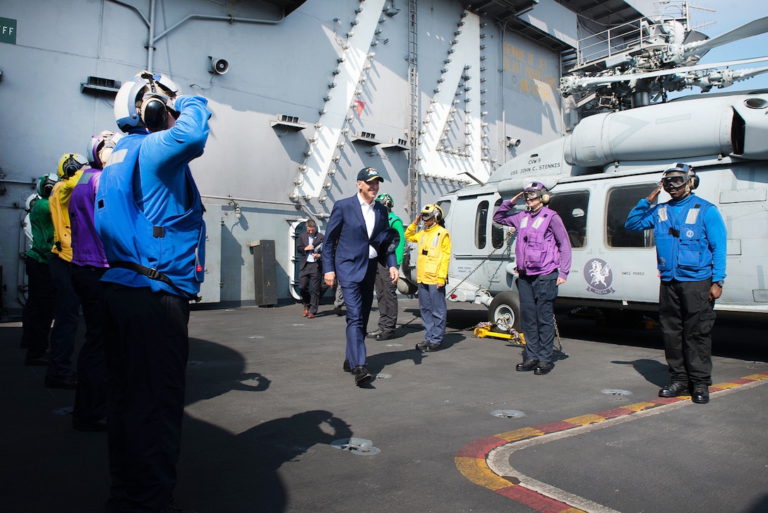 Sailors salute Vice President Joe Biden at the conclusion of his visit to the USS John C. Stennis during the 2016 Rim of the Pacific exercise in the Pacific Ocean, July 14, 2016. Navy photo by Petty Officer 3rd Class Tomas Compian