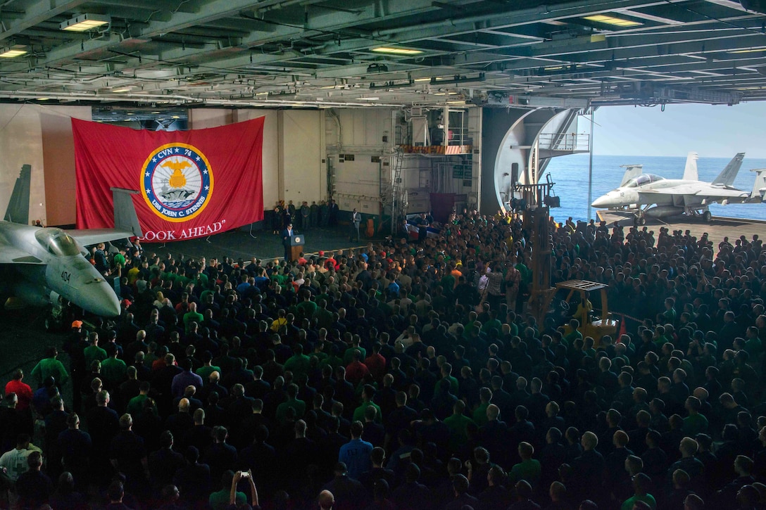 Sailors listen as Vice President Joe Biden addresses them in the hangar bay of the USS John C. Stennis during the 2016 Rim of the Pacific exercise in the Pacific Ocean, July 14, 2016. Navy photo by Petty Officer 3rd Class Mike Pernick