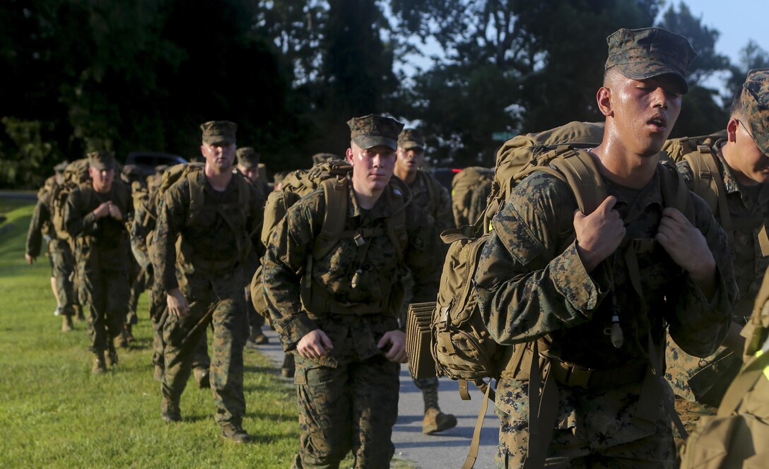 Marines and Sailors with the 26th Marine Expeditionary Unit conduct a conditioning hike aboard Marine Corps Base Camp Lejeune, July 15. The hike was completed by the staff noncommissioned officers and noncommissioned officers within the unit and was designed to build camaraderie and improve unit cohesion. (U.S. Marine Corps photo by GySgt. Andrew Pendracki/Released) 