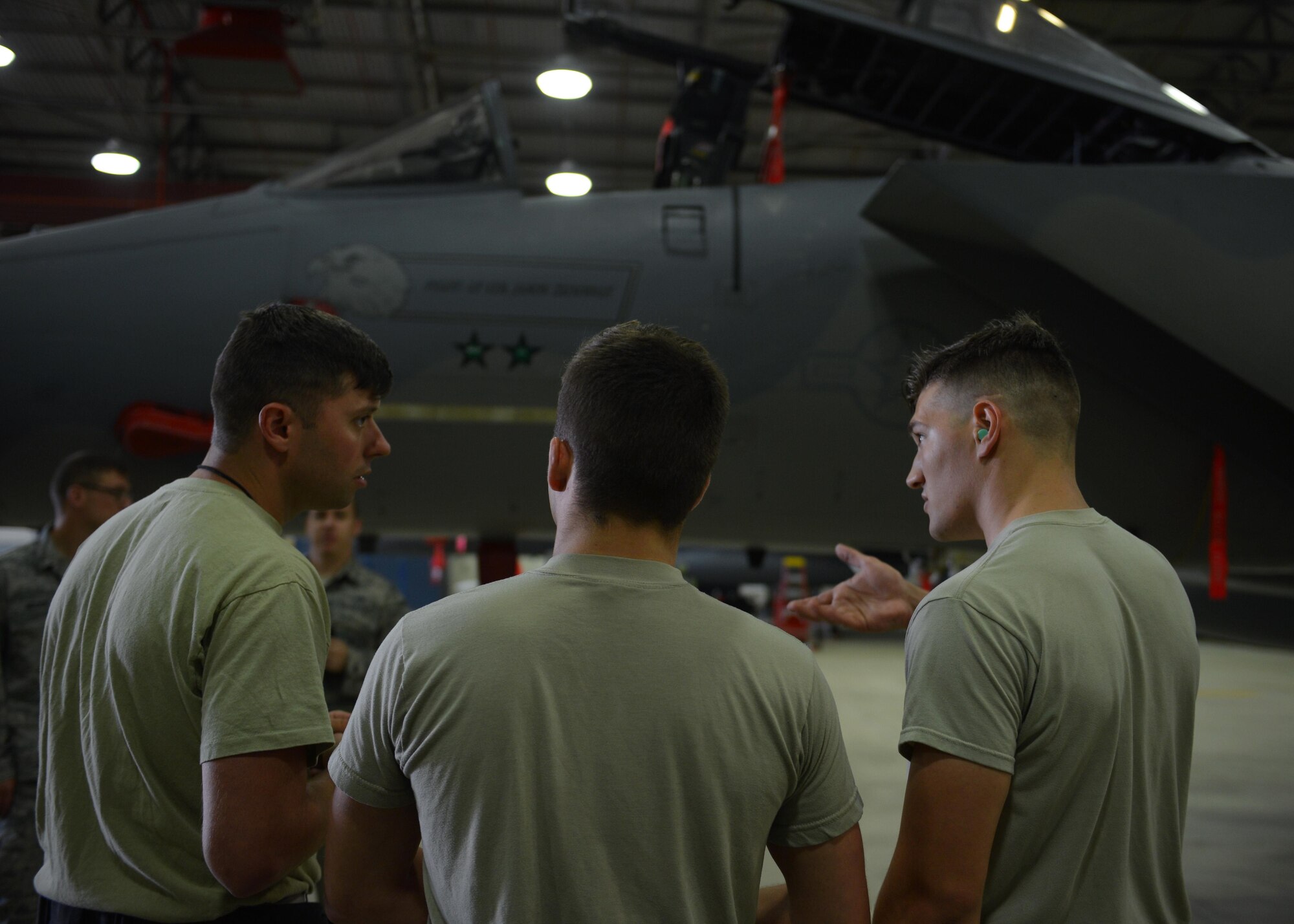 The 748th Aircraft Maintenance Squadron load crew prepares for a 48th Maintenance Group quarterly load crew competition at Royal Air Force Lakenheath, England, July 11. The competition tests participants’ ability to quickly and accurately load missiles onto an F-15 Strike Eagle aircraft. (U.S. Air Force photo/Airman 1st Class Abby L. Finkel) 