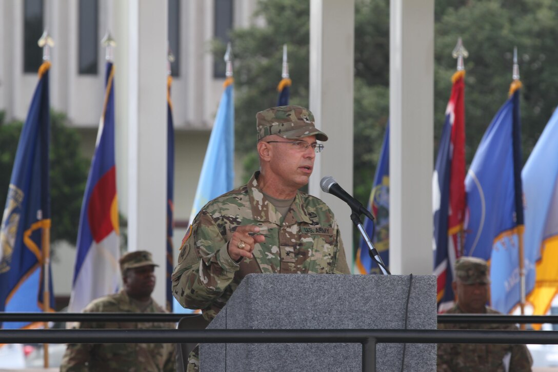 JBSA FORT SAM HOUSTON- Brig. Gen. Kenneth D. Jones, outgoing 4th ESC commanding general, addresses the Soldiers, giving them his final words of wisdom during the Relinquishment of Command Ceremony at the MacArthur Parade Field July 9. The ceremony symbolizes the continuity of authority as the command is passed from one individual to another. Brig. Gen. Jones, a Texas native from Bryan, took command of the 4th ESC last May, just a month before the command deployed in support of the 1st Sustainment Command (Theater) and conducted operations in five countries within the CENTCOM area of operations.  (Photo by Spc. Eddie Serra, 205th Press Camp Headquarters)