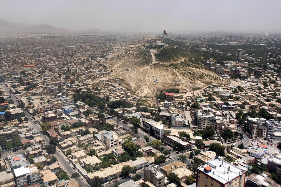 The view from the aircraft shows Kabul, Afghanistan, July 15, 2015, as Marine Corps Gen. Joe Dunford, chairman of the Joint Chiefs of Staff, arrives in the city. DoD photo by Navy Petty Officer 2nd Class Dominique A. Pineiro