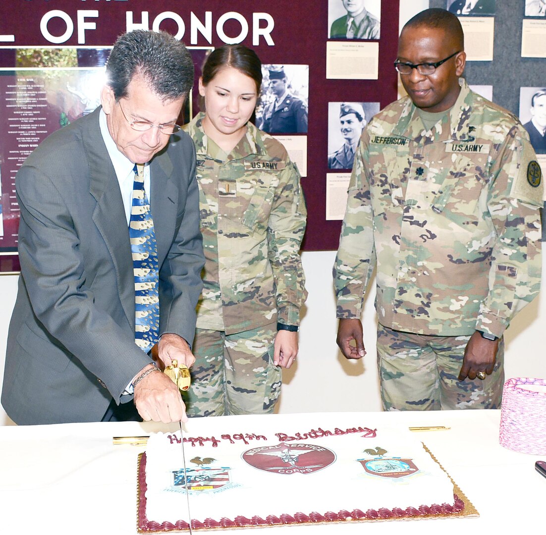 (From left) Retired Col. Greg Griffin, 2nd Lt. Hannah Martinez, and Lt. Col. Marion Jefferson cut the ceremonial cake at June 30 at the U.S. Army Medical Department Museum at Fort Sam Houston., celebrating 99 years of the Medial Service Corps.
