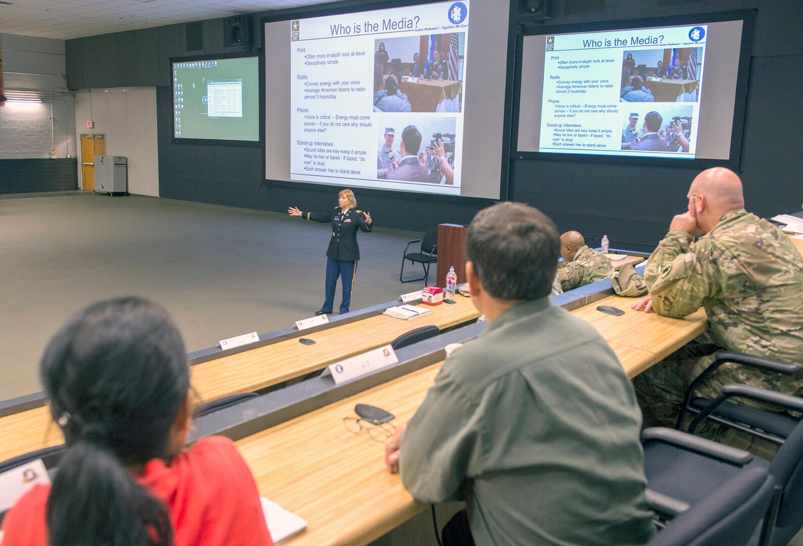 Lt. Col. Carol McClelland, U.S. Army South public affairs deputy director, provides media training to family assistance teams during the reintegration rehearsal of concept drill at Fort Sam Houston June 28.