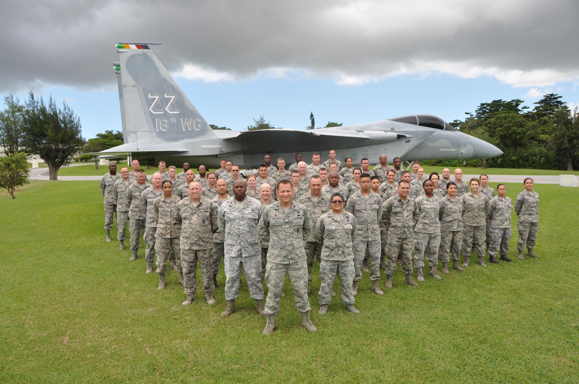Members of the 944th Logistics Readiness Squadron pose for a unit photo during their two week annual tour trip to Kadena Air Base, Japan. Citizen Airmen were given the opportunity to serve alongside Active Duty counter parts at the 18th Wing.  The significance of an off station AT proved to be invaluable for both wings.  